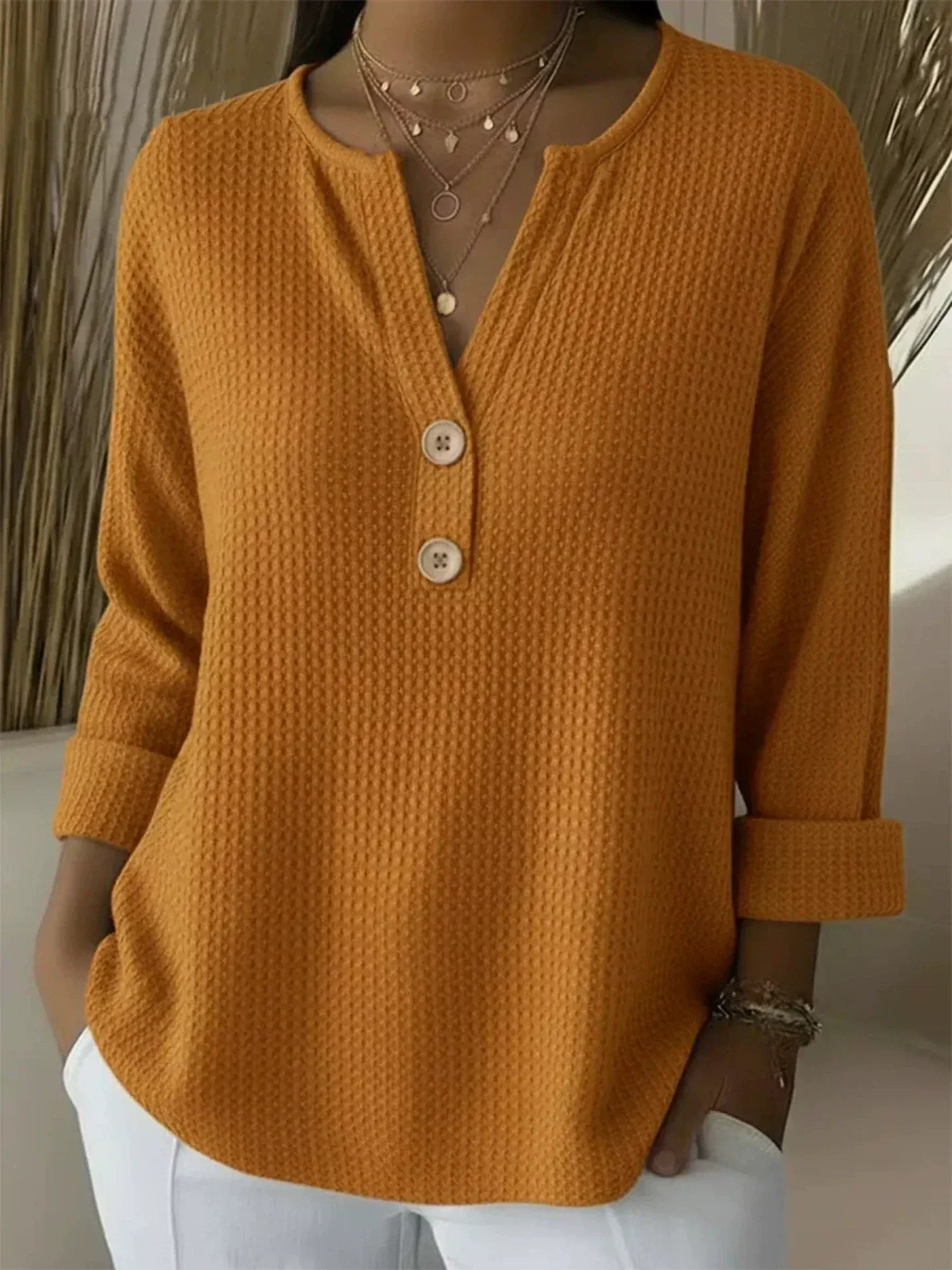 LUCIA | MAGLIA HENLEY GOFFRATA CON BOTTONI